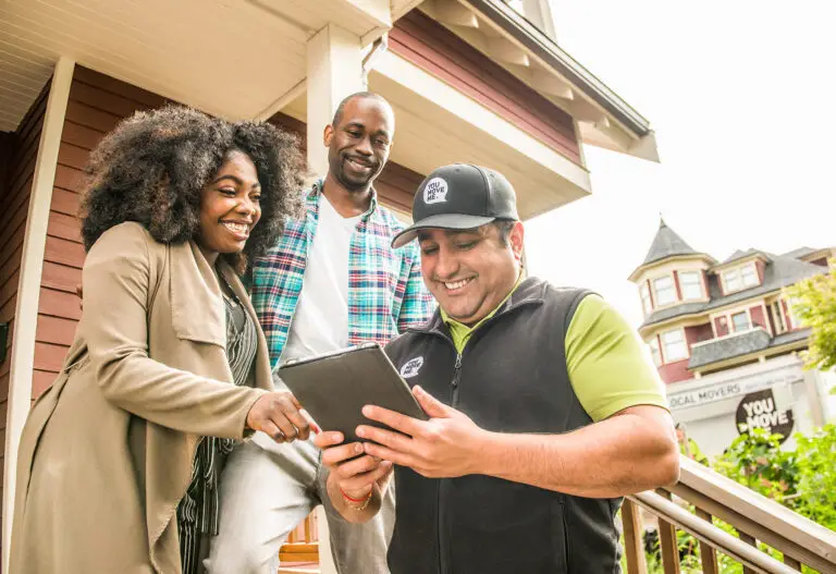 happy family talking with movers