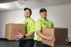 commercial movers holding boxes