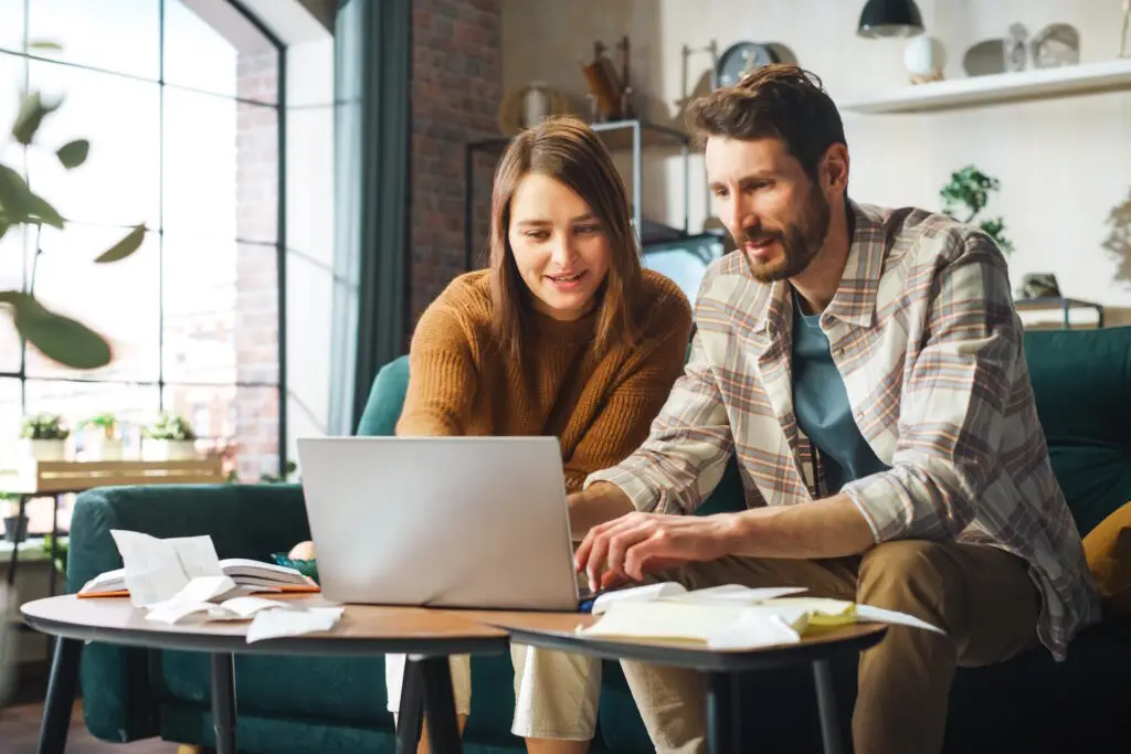 couple updating address online after moving
