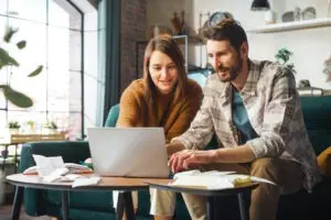 couple updating address online after moving