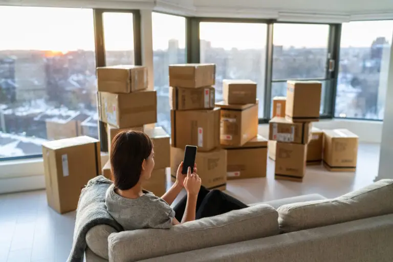 woman packed up calling moving company