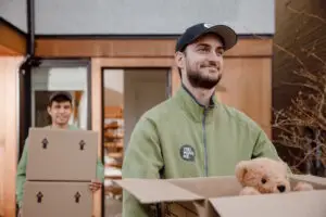 You Move Me mover holding moving box